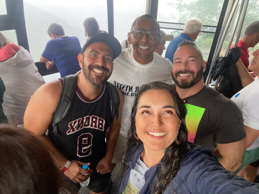Happy travelers inside the Sugarloaf Mountain cable car in Rio de Janeiro