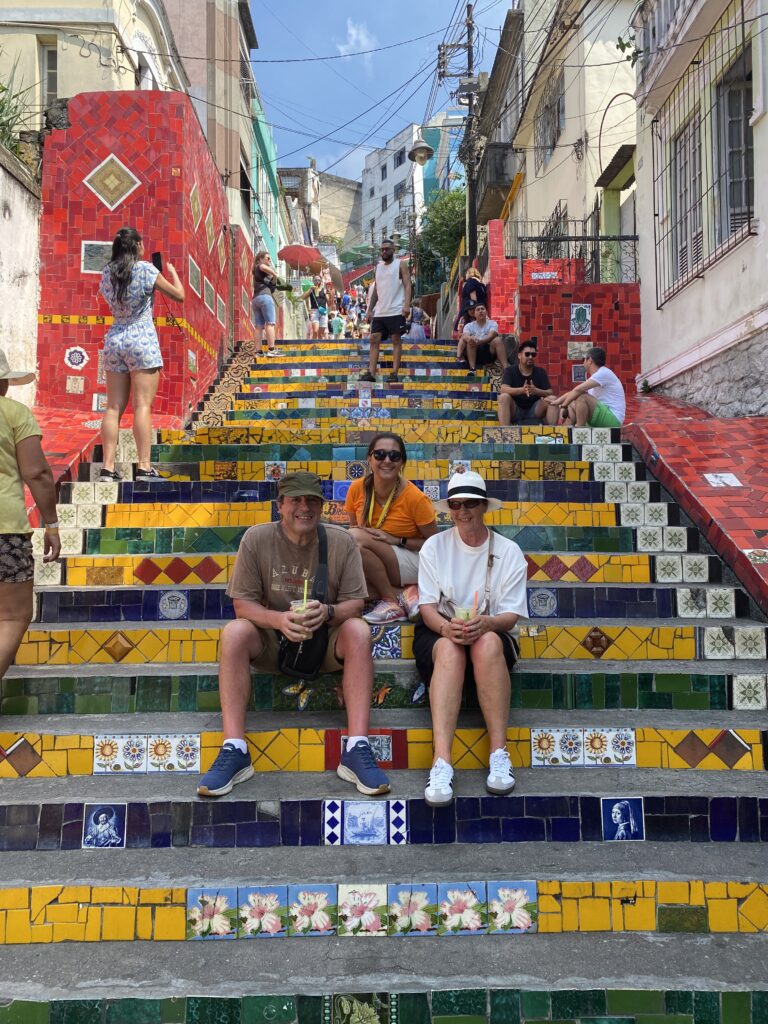 Travelers enjoying the colorful Selarón Steps in Rio de Janeiro